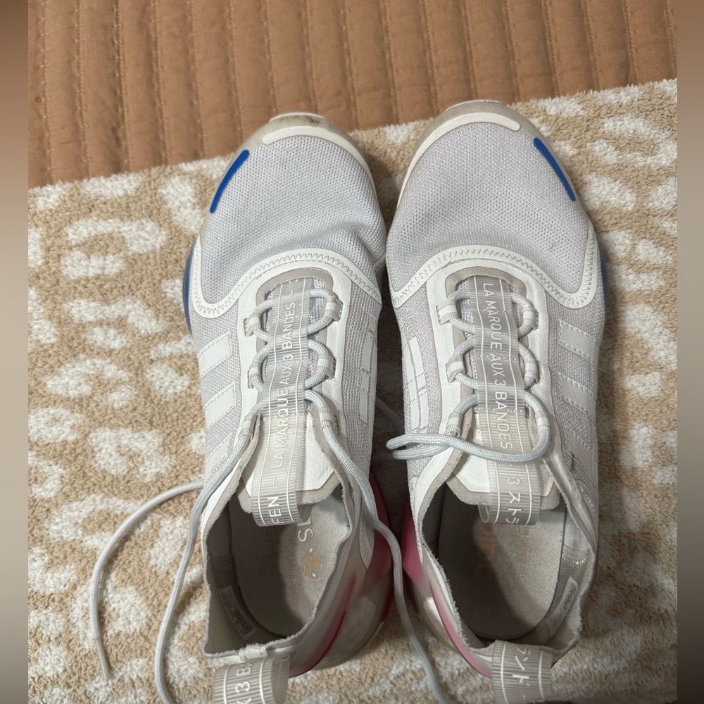 Adidas, NMD red, white, and blue. pretty worn, with slight staining